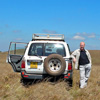 Man standing next to 4x4 offroad in Malawi