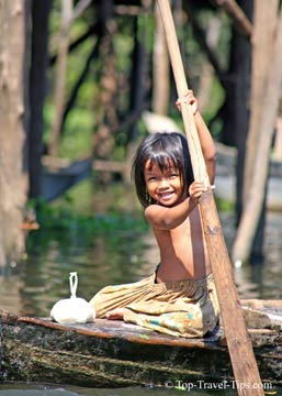 Young girl traveling alone on a small boat