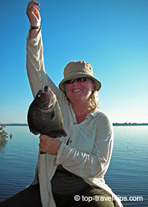 Asa Gislason fishing piranha on Amazon River