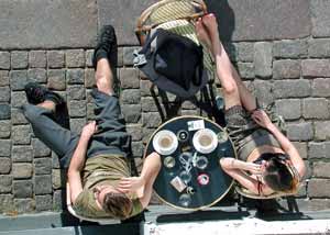 Relax together Couple drinking coffee in outside coffee shop
