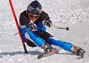 Young skiier in skiing in a ski competition