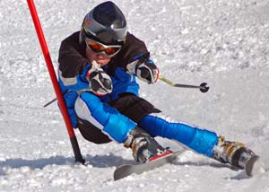 Young fit skiier Young skiier in skiing in a ski competition