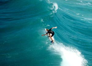 Surfer surfing on a large wave