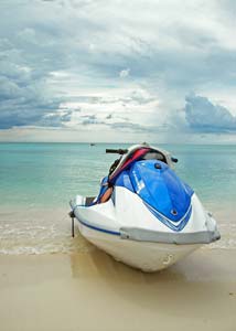 Solo travel tips - Travel alone Jetski parked on a beach