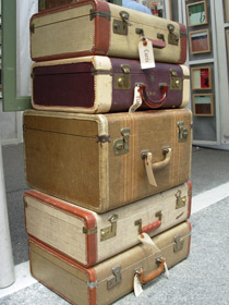 Vacation packing list - Stack of bags Stack of five old luggage bags