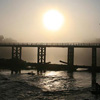 Sunrise over bridge in Laos