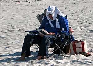 Man wearing sun protection clothing