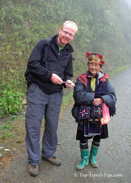 Talk to strangers Man travelling solo talking to an old lady in Vietnam